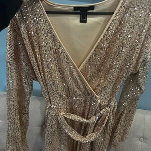 Gold sequin dress! Super comfortable and flattering! Worn once